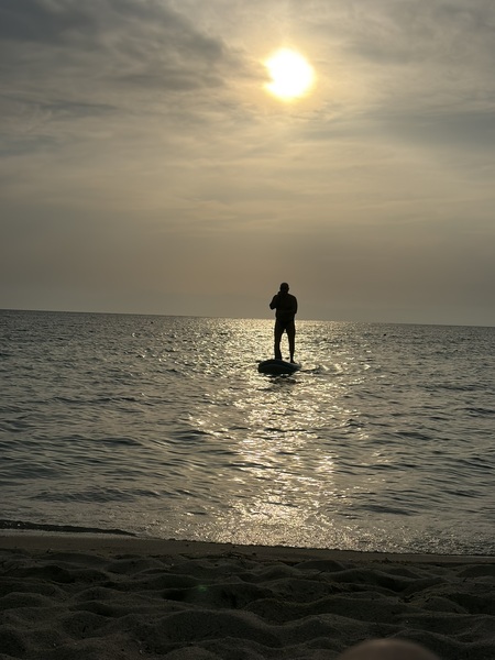 On a paddleboard during sunset at Panama Beach